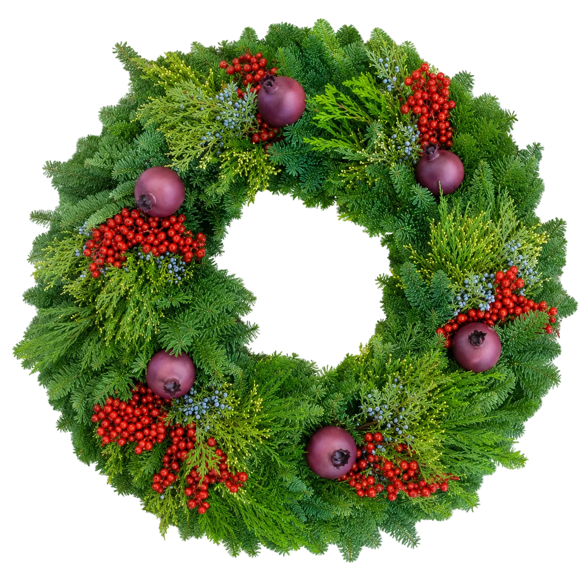 A festive green Christmas wreath decorated with red berry clusters, purple ornaments, and small blue berries on a solid white background.